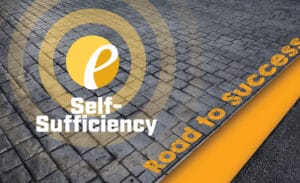 graphic of a gray and yellow road with Self-Sufficiency, Road to Success text