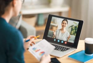 An aspiring entrepreneur learns about franchise ownership from an Entrepreneur’s Source Career Ownership Coach in a virtual meeting.