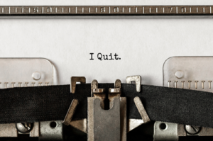 Close-up typewriter image with the words I Quit