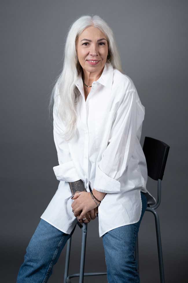 woman sitting on stool 