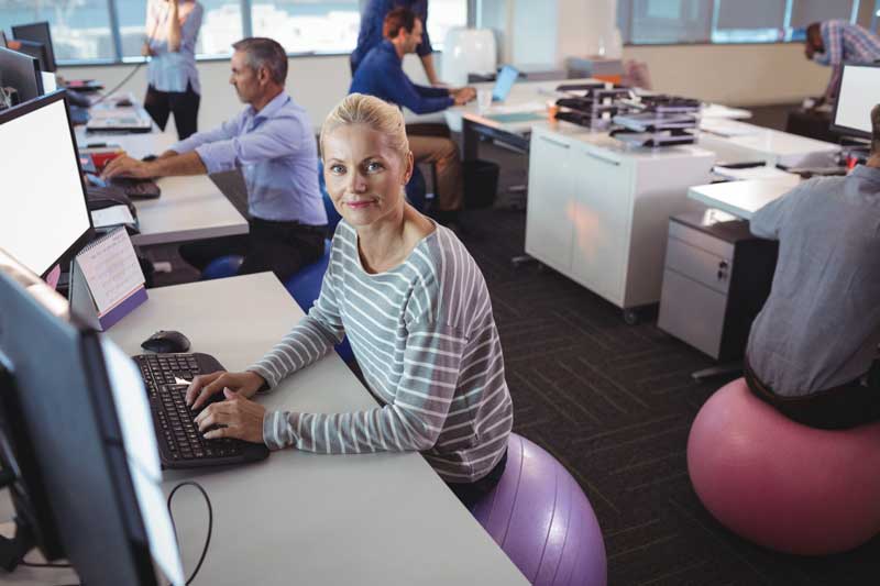 portrait-of-businesswoman-working-800px workplace wellness
