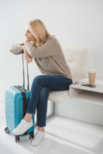 business traveler in travel attire