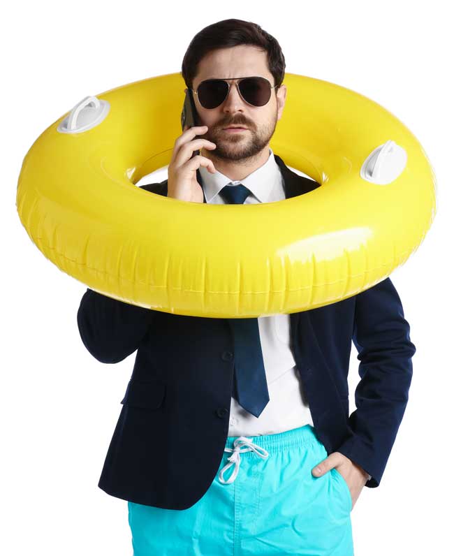 businessman-in-swim-trunks-with-yellow-inflatable