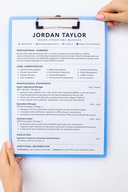holding-copies-of-resume-450px