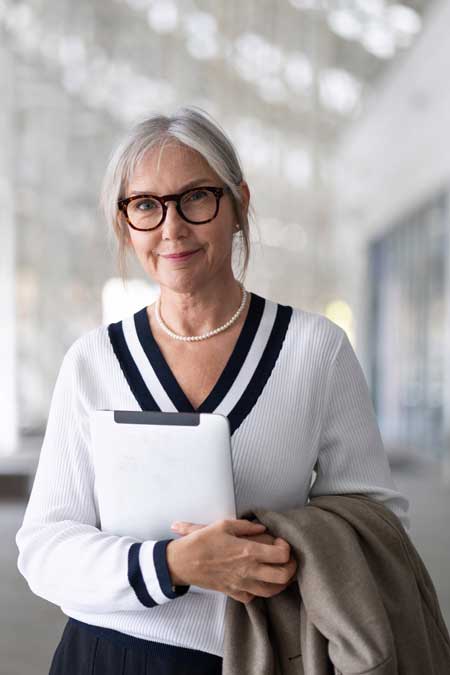 professional-woman-holding-tablet-computer-450px