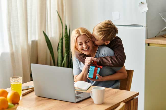 cheerful-woman-receiving-gift-from-blond-haired